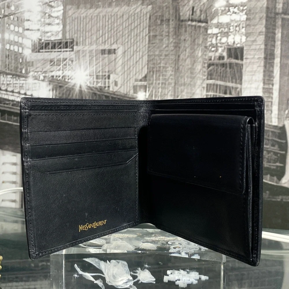 Authentic YSL Sleek black leather bifold wallet